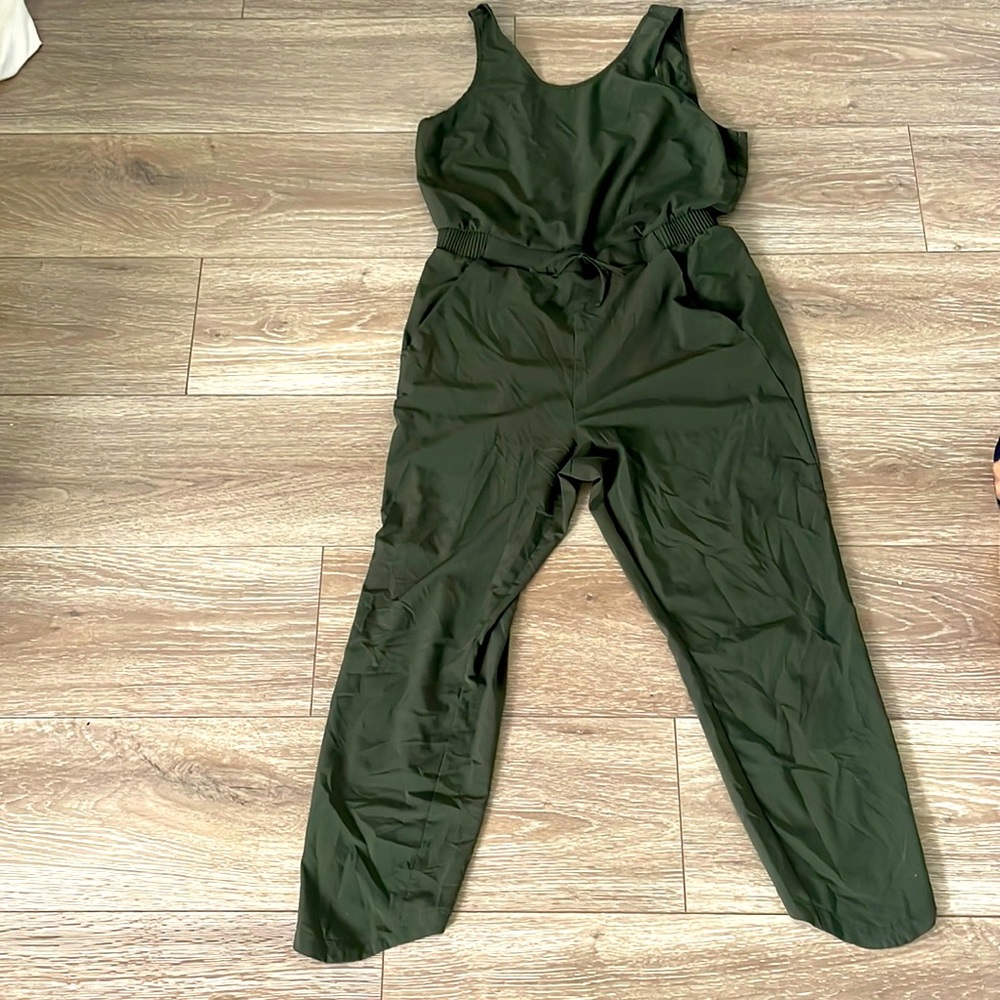 Green tank top jumpsuit with drawstring at waist band